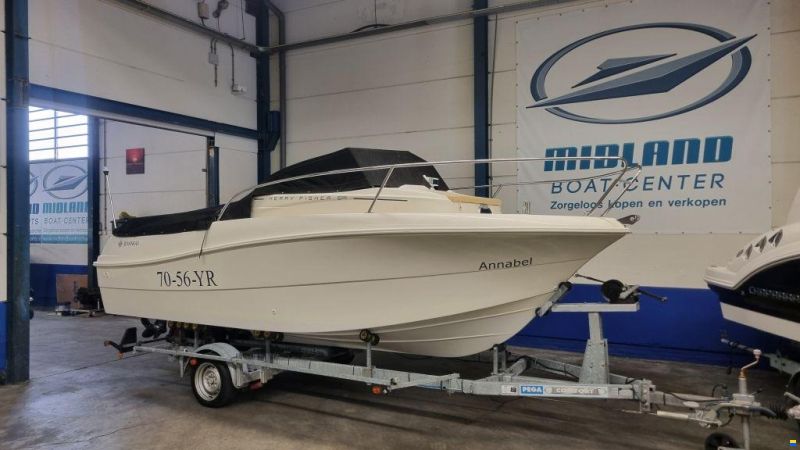 Jeanneau Merry Fisher 585 met Suzuki DF90A en tra