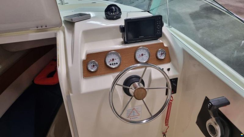Jeanneau Merry Fisher 585 met Suzuki DF90A en tra