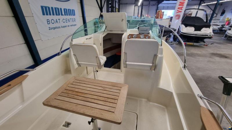 Jeanneau Merry Fisher 585 met Suzuki DF90A en tra