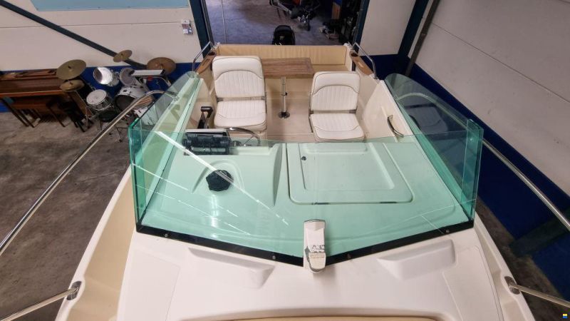 Jeanneau Merry Fisher 585 met Suzuki DF90A en tra