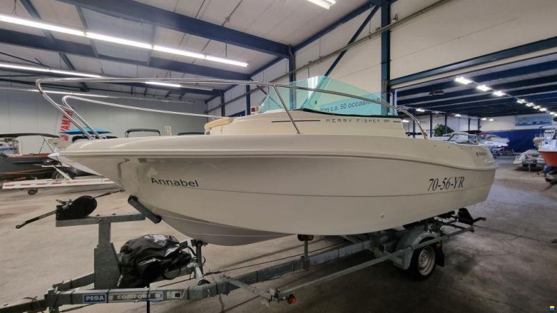 Jeanneau Merry Fisher 585 met Suzuki DF90A en tra