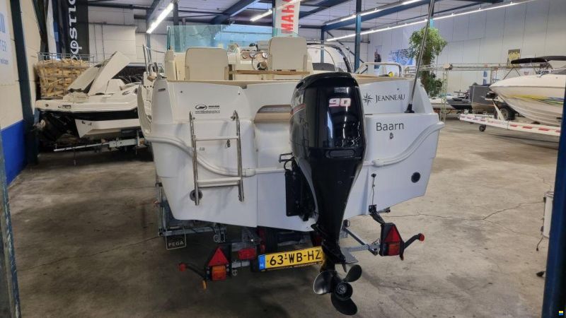 Jeanneau Merry Fisher 585 met Suzuki DF90A en tra