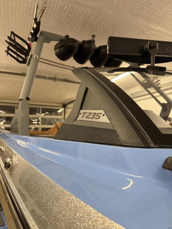 T235
