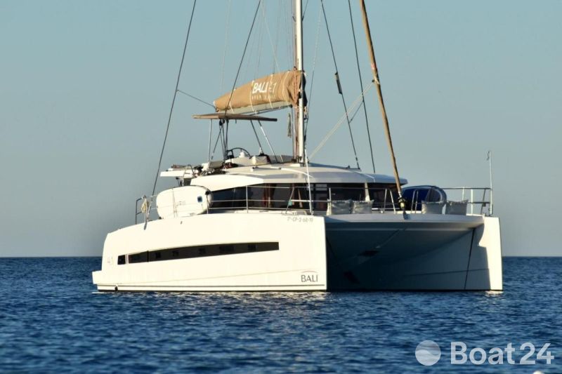 2019 Bali 4.1 catamaran sailing on calm blue waters.