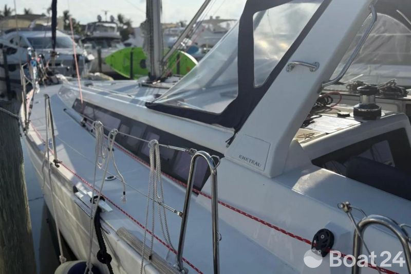 2017 Beneteau Oceanis 48 sailboat docked at marina, side view.