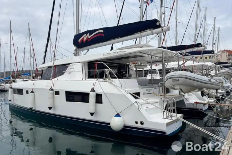 2020 Leopard 45 catamaran docked in a marina, featuring sleek design and modern amenities.