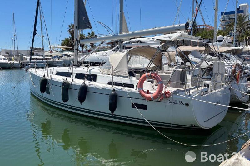 2020 Hanse 388 sailboat docked in marina, featuring sleek design and modern amenities.