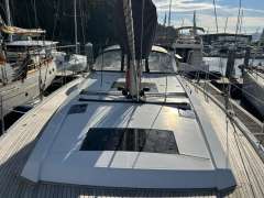 Hanse 510 yacht, 2022 model, docked at marina with other boats.