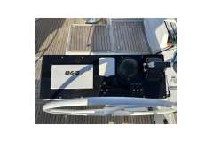 Steering wheel and control panel of 2022 Hanse 510 yacht with B&amp;G navigation system.