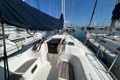 2005 Dufour 40 Performance sailboat docked in a marina, showcasing deck and rigging.
