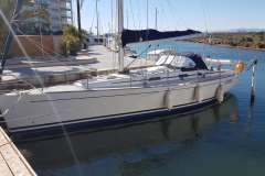 2005 Grand Soleil 40 sailboat docked in a sunny marina.