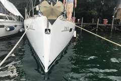 Beneteau Oceanis 41 sailboat docked, 2013 model, anchored in calm waters.