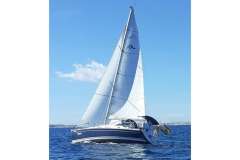 Sailing yacht Hanse 315, 2006 model, cruising on open sea under clear blue sky.