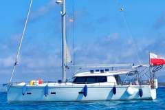 Sailing yacht Moody 45 DS 2020 on calm blue sea under clear sky.