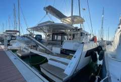 2022 Leopard 42 catamaran docked at marina, showcasing sleek design and modern features.