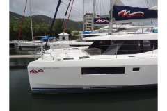 2020 Leopard 45 catamaran docked at marina, featuring sleek design and modern amenities.
