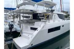 2022 Leopard 45 catamaran docked, featuring spacious deck and modern design.