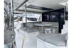 Spacious outdoor seating area on a 2022 Leopard 45 catamaran yacht.