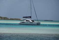 2020 Leopard 40 catamaran sailing in turquoise waters.