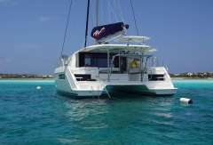 2020 Leopard 40 catamaran anchored in clear turquoise waters.