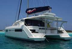 2020 Leopard 40 catamaran sailing on clear blue waters.