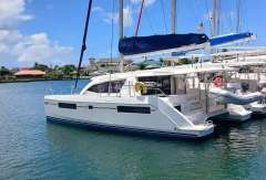 2019 Leopard 40 catamaran docked in a sunny marina.