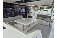 Spacious seating area on a 2020 Leopard 45 catamaran with modern interior design.