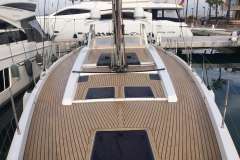 Deck view of 2017 Hanse 588 yacht, featuring sleek wooden finish and modern design.