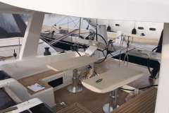 2017 Hanse 588 yacht cockpit with dual steering wheels and teak decking.