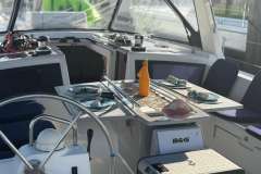 Luxurious 2017 Beneteau Oceanis 48 yacht interior with elegant dining setup.