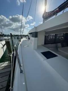 2020 Leopard 50 yacht docked under a sunny sky.