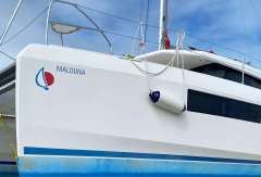 Leopard 45 catamaran on blocks, 2020 model, with blue hull and white deck.
