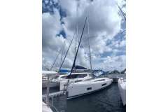 2020 Beneteau Oceanis 46.1 sailboat docked under a cloudy sky.