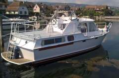 Beachcraft 9.00 AK Iate a motor