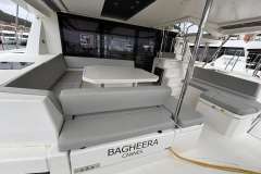 Luxurious 2020 Leopard 45 yacht with spacious seating and dining area, docked in Cannes.