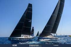 Sailing race featuring 2019 Nautor Swan Club Swan 50 yachts on open water.