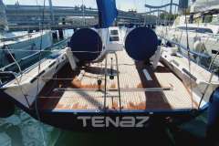 2019 Nautor Swan Club Swan 50 yacht docked, showcasing sleek wooden deck and modern design.
