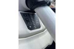 Close-up of 2024 Karnic SL 702 boat dashboard controls and display panel.