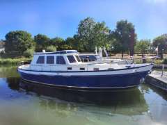 Molenmaker en Mantel kotter motorsailer Motorjacht
