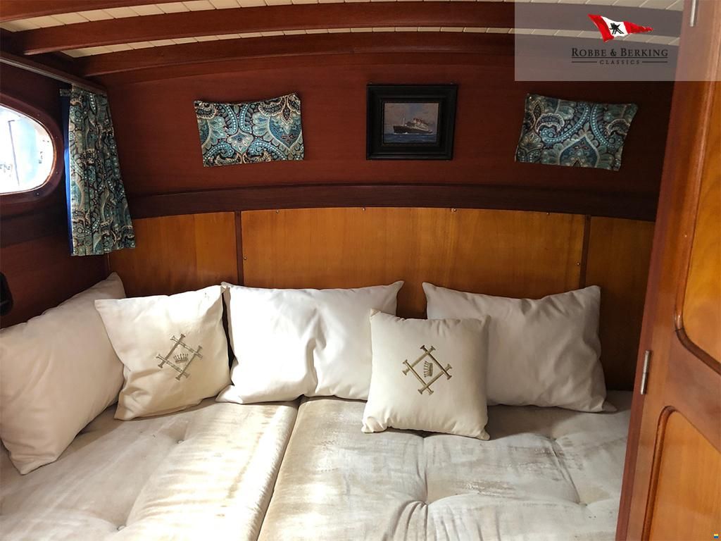 Premium Photo  Wooden table with food and white sofa in cabin yacht  interior