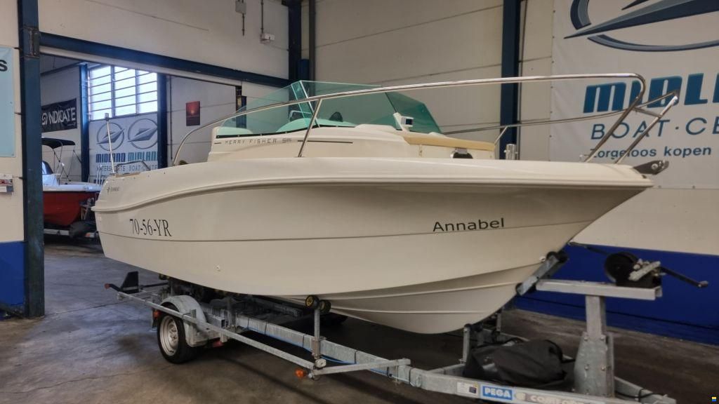 Jeanneau Merry Fisher 585 met Suzuki DF90A en tra