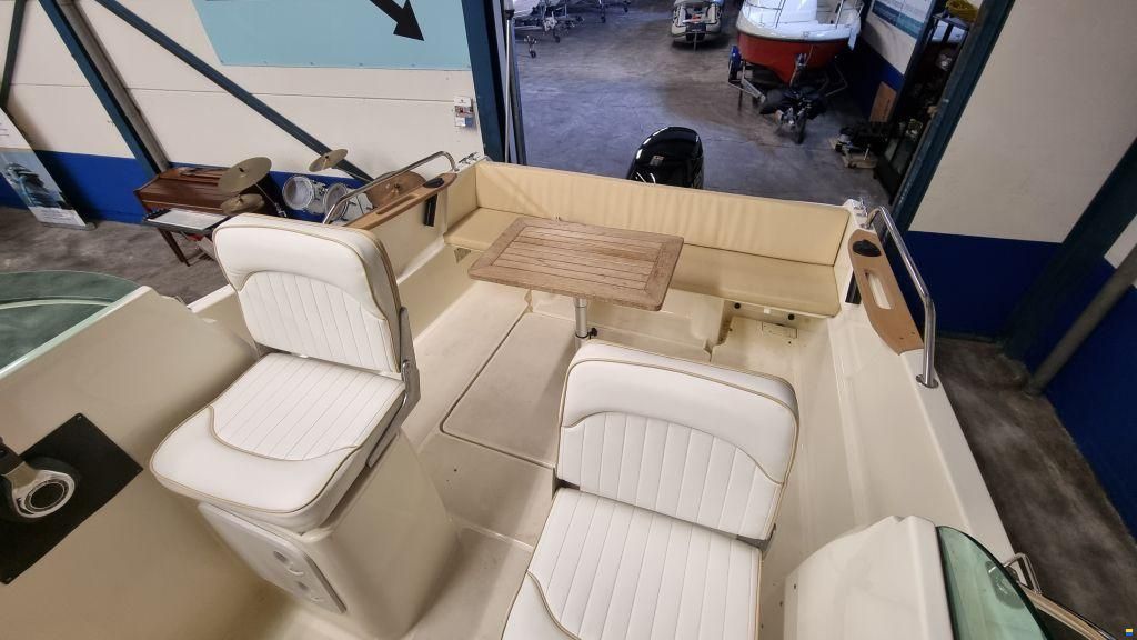 Jeanneau Merry Fisher 585 met Suzuki DF90A en tra