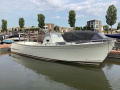 Rh&eacute;a 35 Open Iate a motor