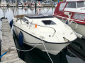 Quicksilver Flot Quicksilver 555 med Mercury 100 HK Barco cabinado