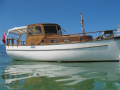 Vollholzboot Barca a motore d'epoca