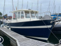 Rh&eacute;a 730 Fishing Bateau à cabine